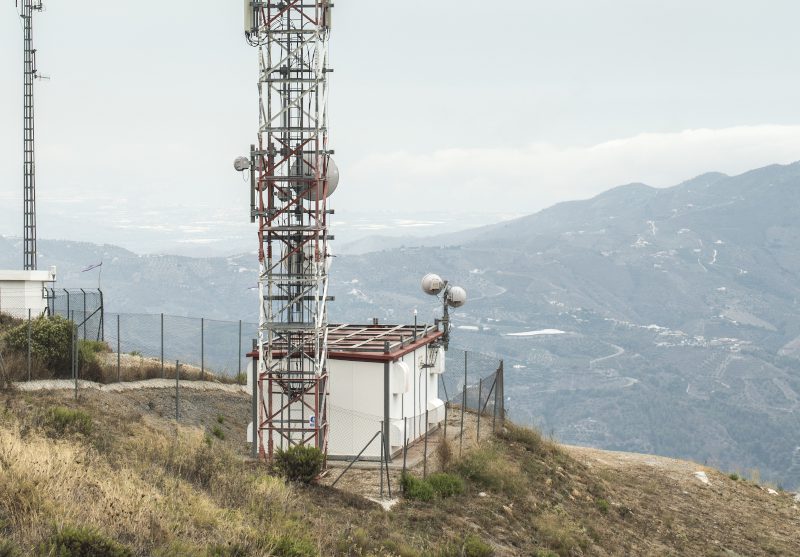 Telecommunication (GSM) towers with TV antennas on the mountain